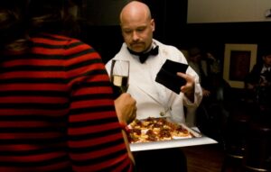 Cater Dallas Waiter Serving Guests