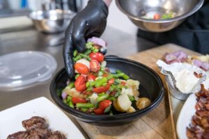 Cater Dallas chef preparing a catering meal