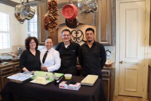 Cater Dallas chef and staff smiling at an event