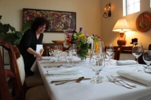 CaterDallas setting up linens for an event