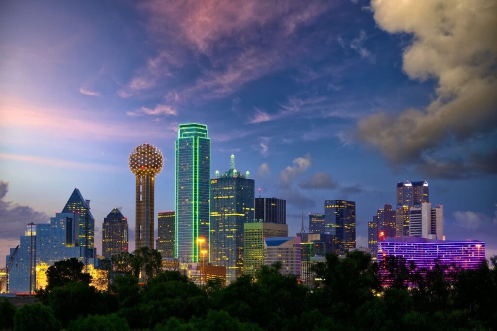 A wide shot of the Dallas Skyline at sunset